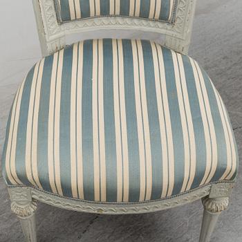 Six (3+2+1) late 18th century Gustavian chairs.