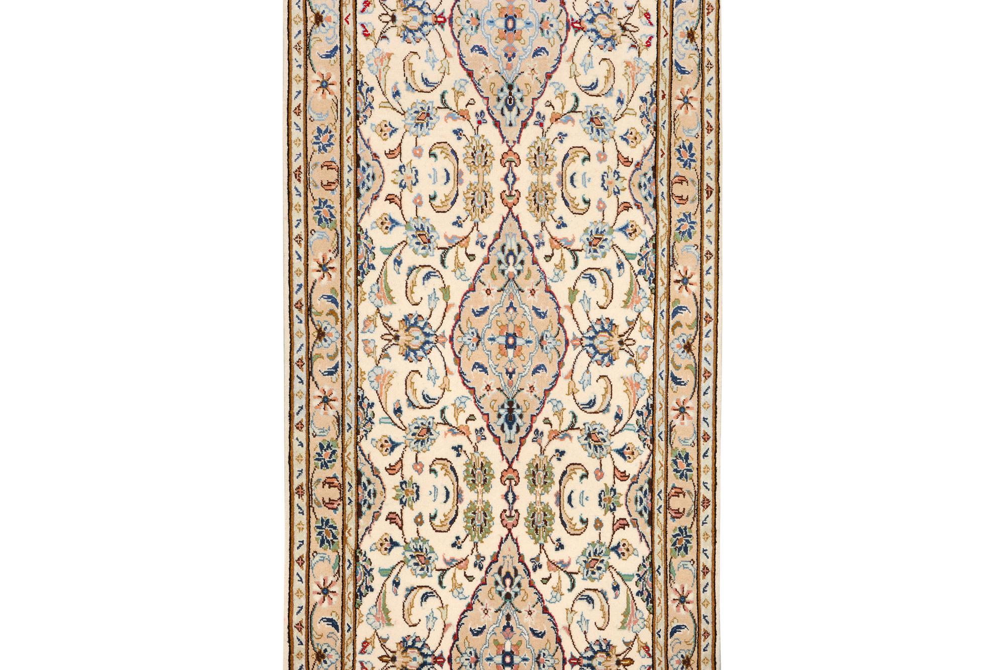 A Kashan runner carpet, c. 344 x 81 cm.