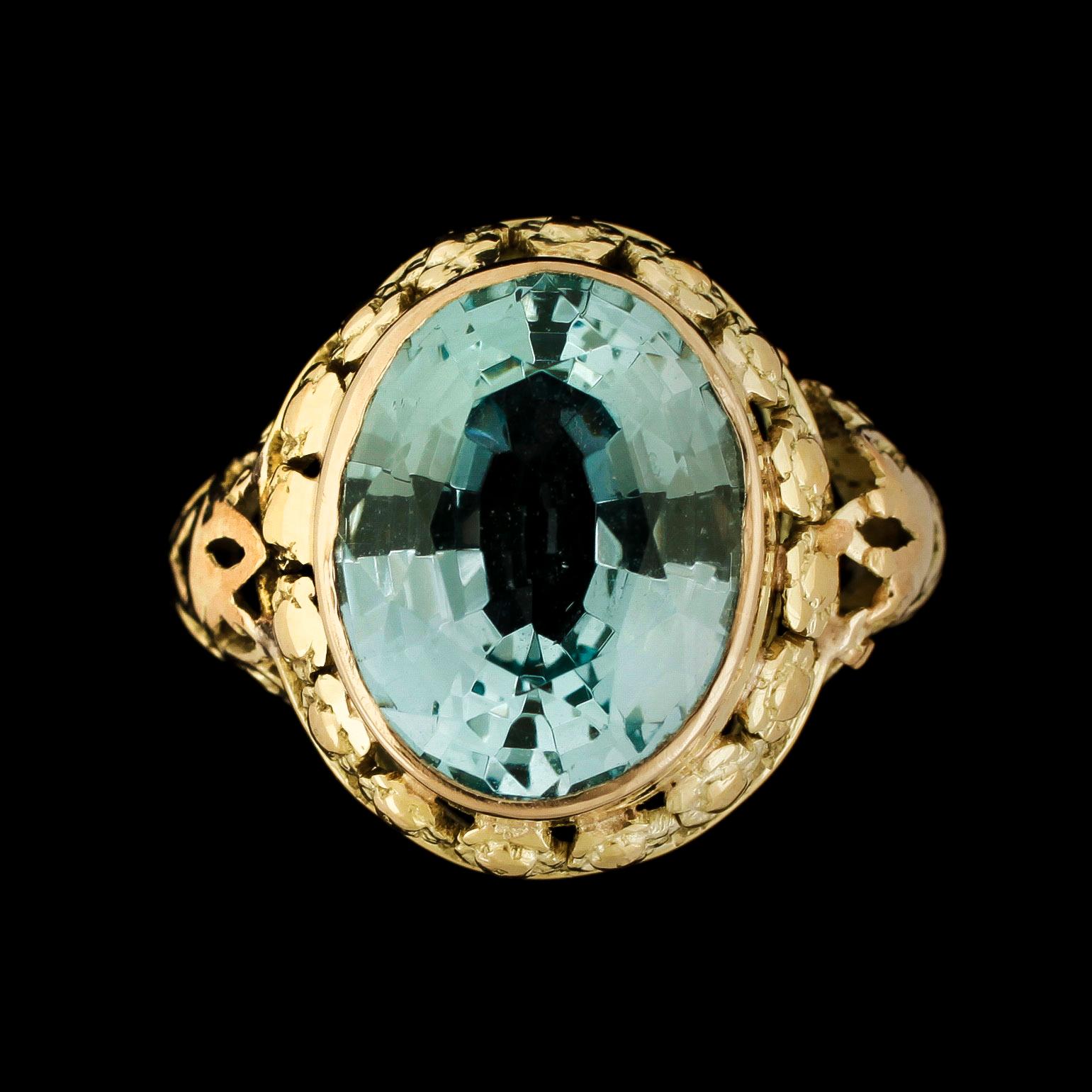 RING, 14k guld med blågrön troligen spinell, omkring 1900. Vikt 5,1g.