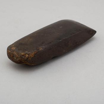 A neolithic polished stone axe.