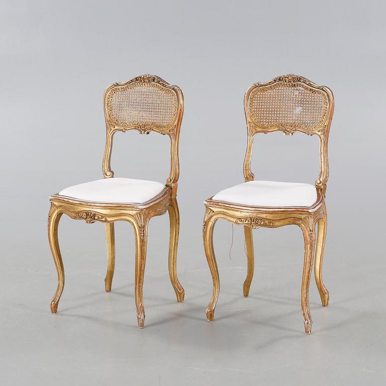 A pair of chairs from the first half of the 20th century.