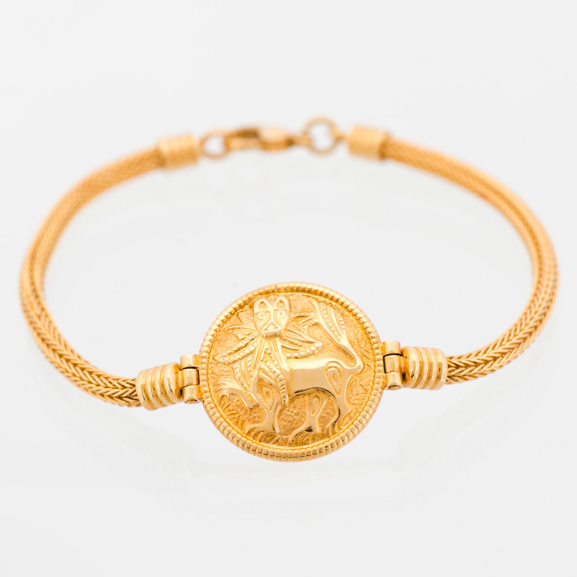 ARMBAND, "Sollejonet", 18K guld. Kalevala Koru 1999.
