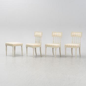 A set of three chairs and a stoolm late Gustavian style from around the year 1900.