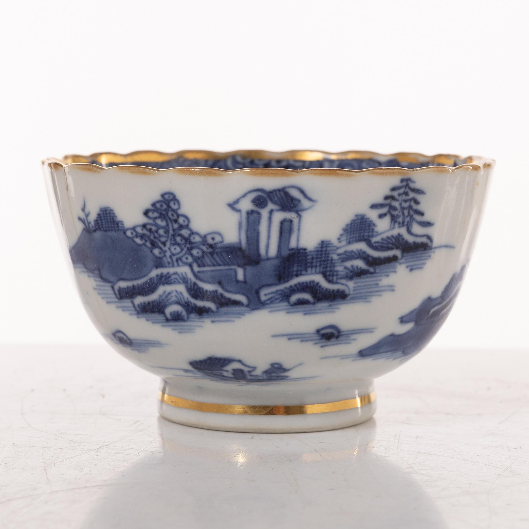 A group  of three serving dishes, a serving bowl, a cup, and seven plates, porcelain, including China 18th century.