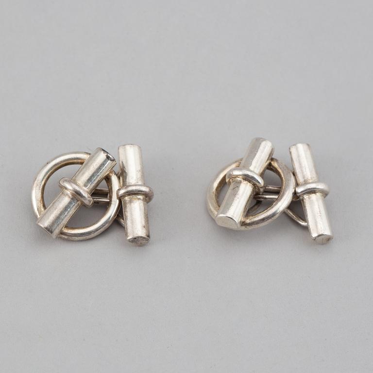 HERMÈS, a pair of silver cuff links.