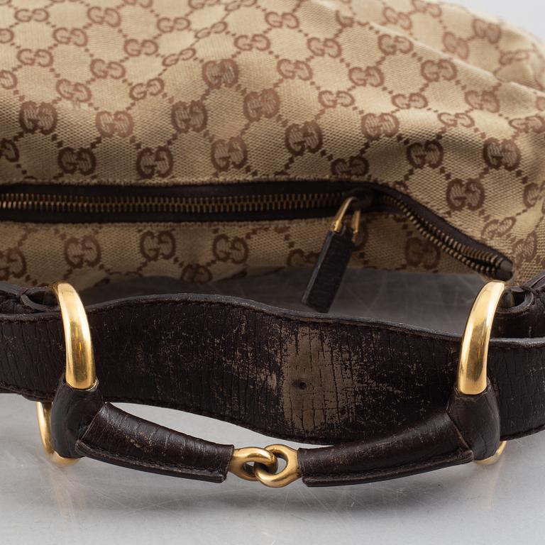 Gucci, a handbag.