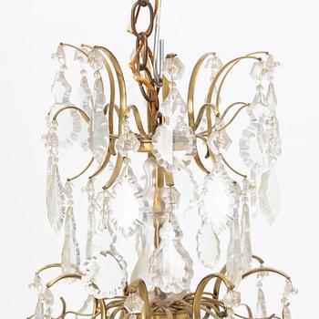 A Rococo style chandelier, early 20th Century.