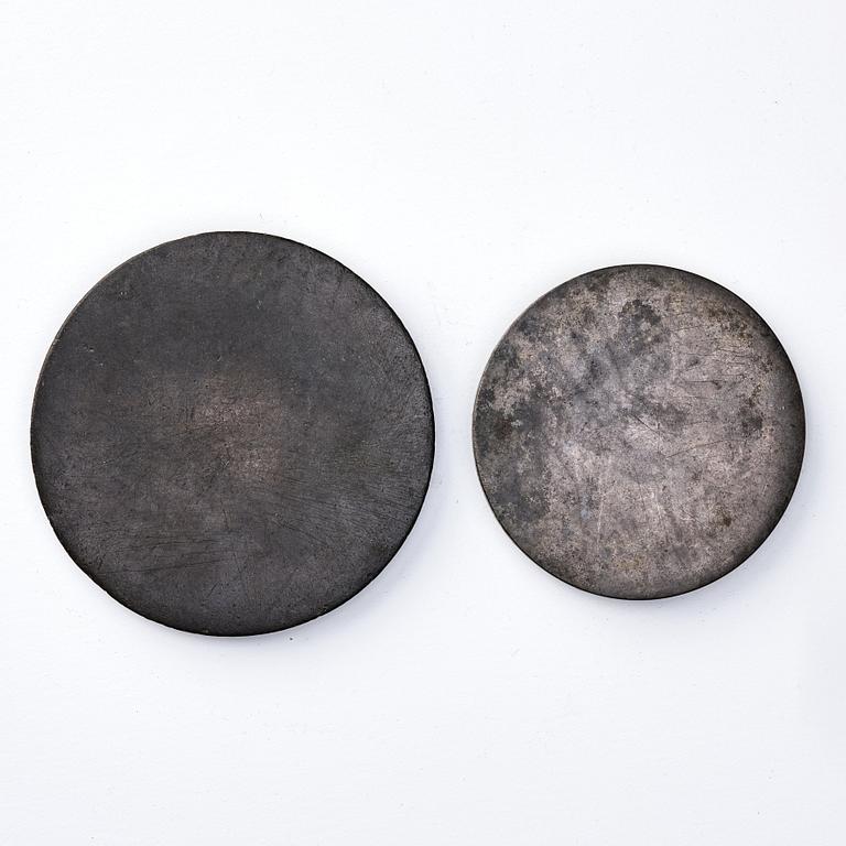 Two bronze mirrors, presumably Han dynasty (206 B.C.-220 A.D.).