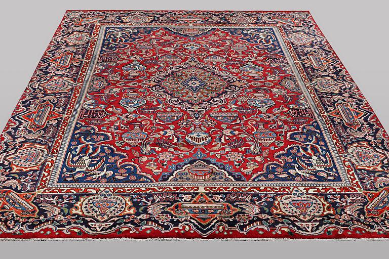 A carpet, Kashan, ca 388 x 290 cm.