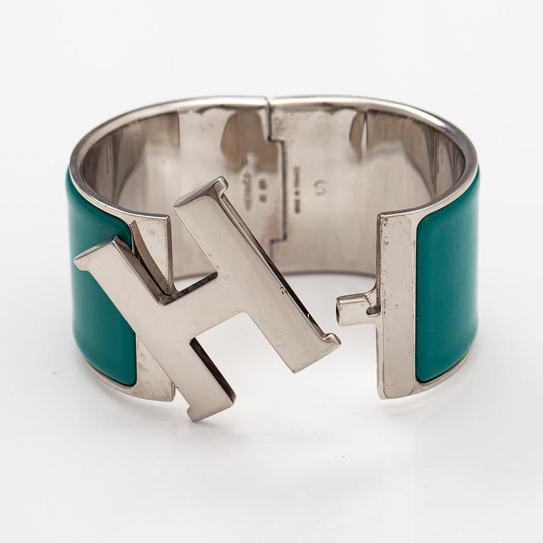 Hermès, A "H click" bracelet made of metal and enamel. Marked Hermès, S, Made in France.