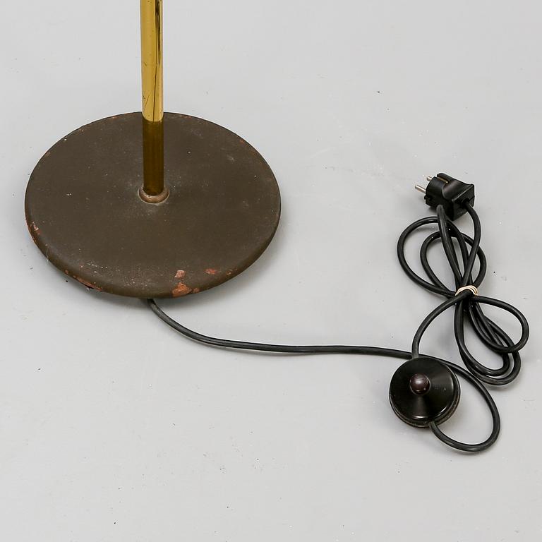A late 20th century brass floor lamp.