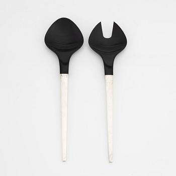 Henning Koppel, a pair of sterling silver and bakelite salad servers, model 'Caravel', Georg Jensen, Denmark, post 1957.