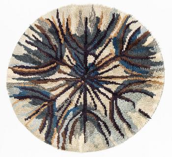 A knotted pile (rya) rug, diameter  180 - 190 cm.