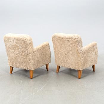 Armchairs, a pair from the 1940s.