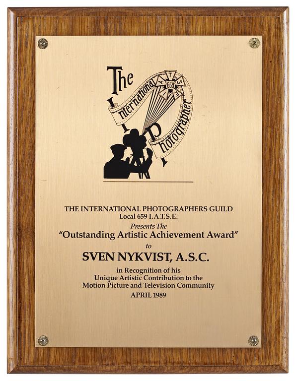 AN AWARD, Outstanding Artistics Achievement Award 1989.