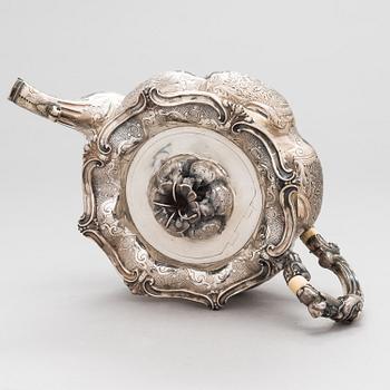 A silver teapot, unknown maker's mark F.G, assay master mark Dimitri Ilyich Tverskoy, Saint Petersburg, Russia 1844.