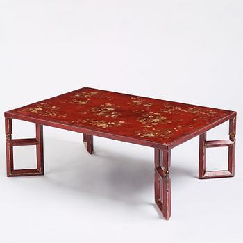 A Chinese red low table, 20th century.