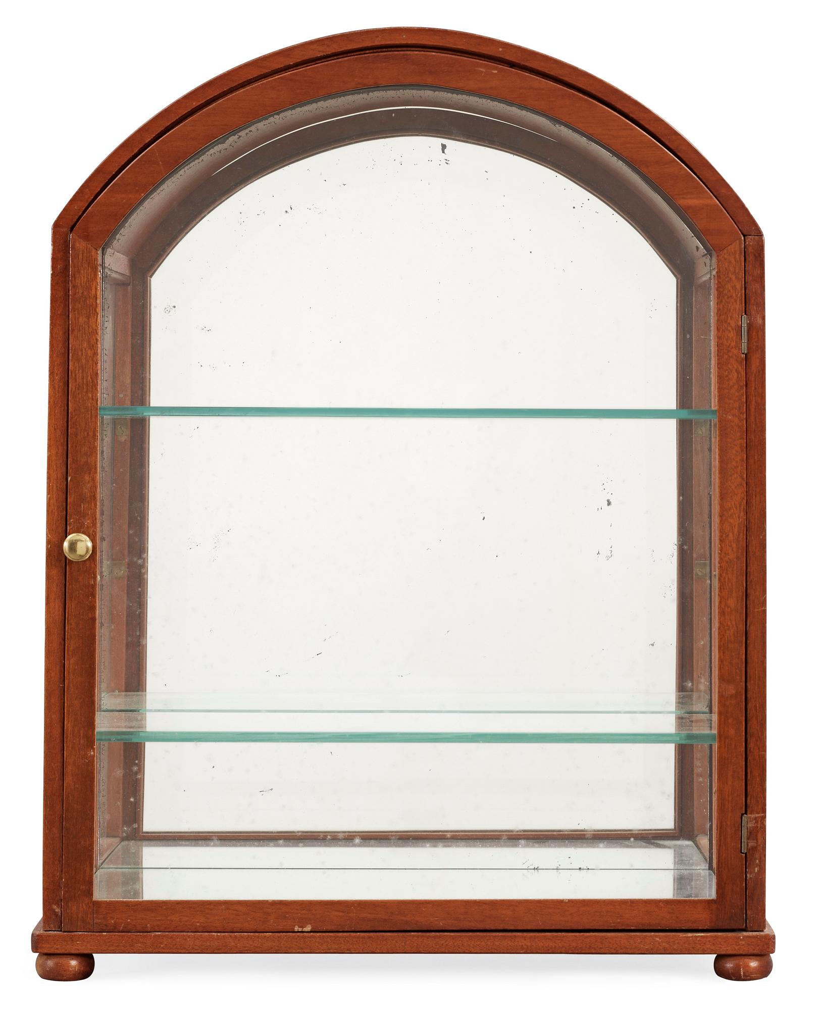 A Josef Frank mahogany showcase cabinet by Svenskt Tenn, model 2070.