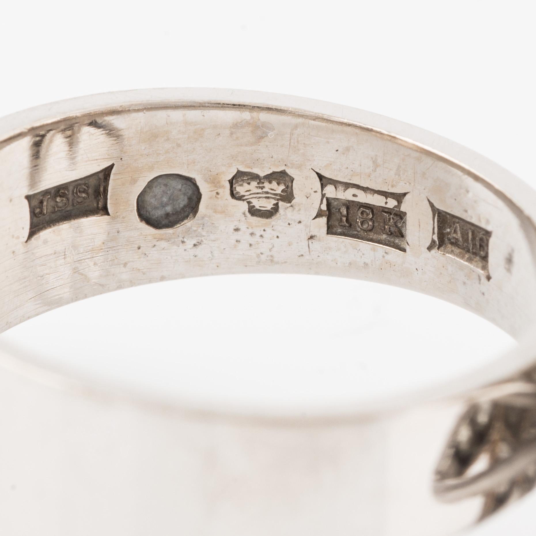 Ring, Jarl Sandin, star-shaped 18K white gold with old-cut diamonds.