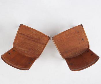 Axel Einar Hjorth, a pair of stained pine 'Lovö' chairs, Nordiska Kompaniet, Sweden 1930s.