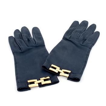 HERMÈS, a pair of blue leather gloves.