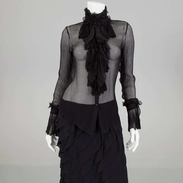 A skirt, topp and a blause by Ralph Lauren.