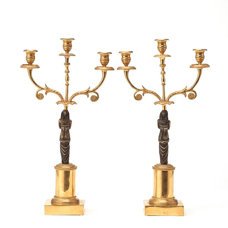 A pair of late Gustavian circa 1800 three-light candelabra.