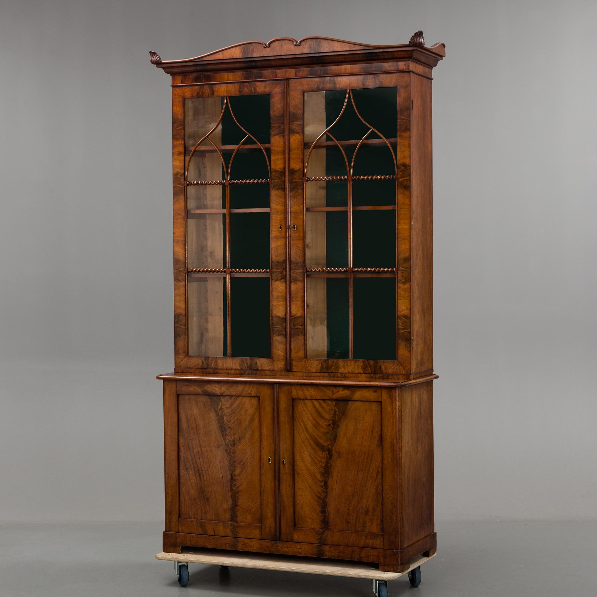 A SWEDISH BOOKCASE, first half of the 19th century.