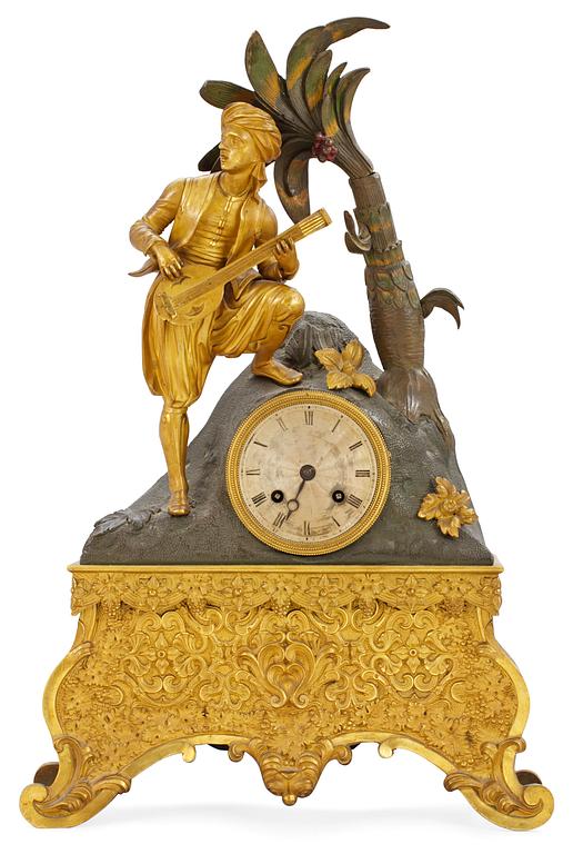 A French 1830/40's century gilt and patinated bronze mantel clock.