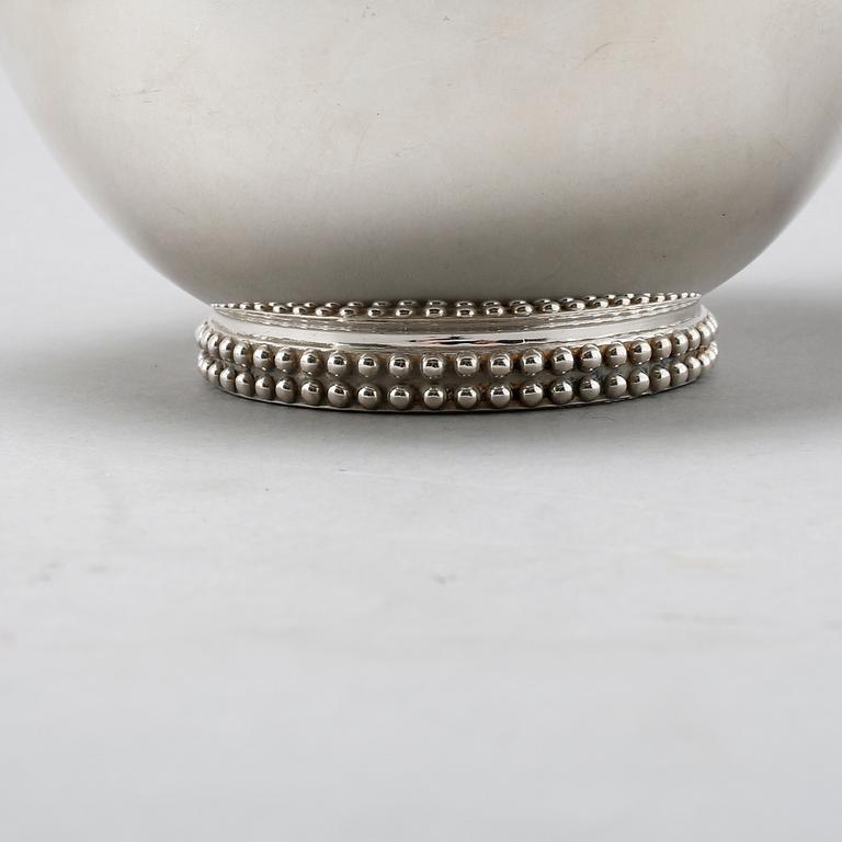 A silver coffee set of four pieces from the middle of the 20th century.