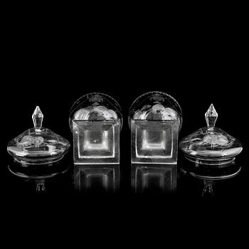 A pair of cut glass jars with covers, late 19th Century.