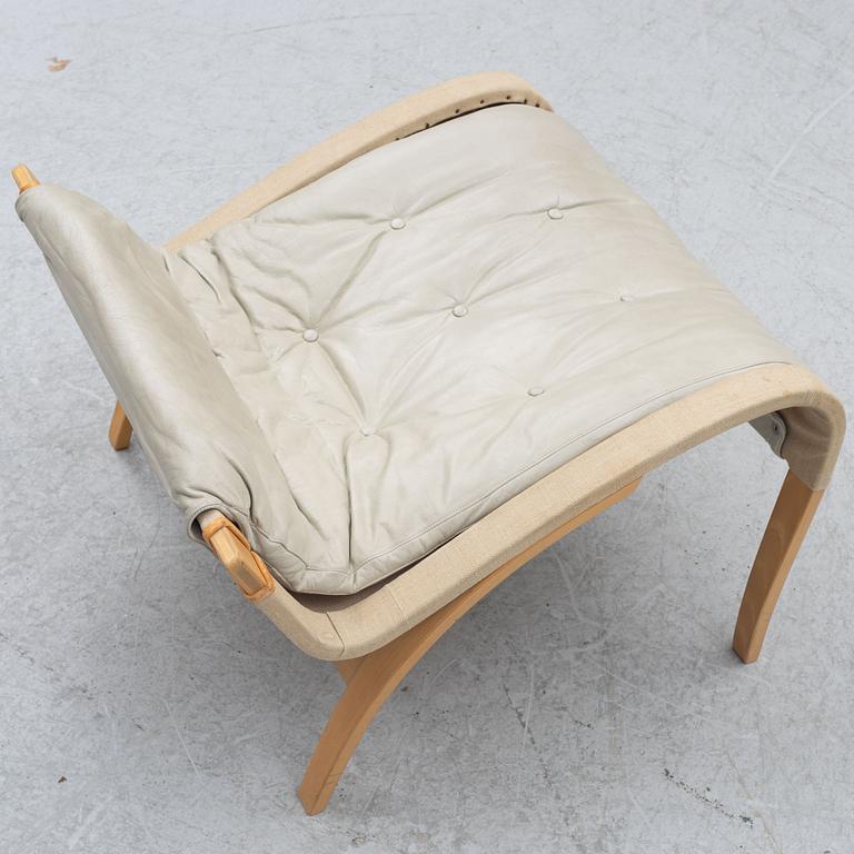 Bruno Mathsson, a 'Pernilla' easy chair witr foot stoll., Dux.