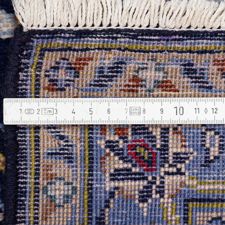 A Kashan carpet, c. 357 x 253 cm.