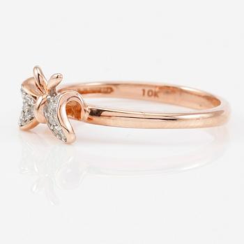 RING, 10K roséguld och diamanter tot ca 0.10 ct.