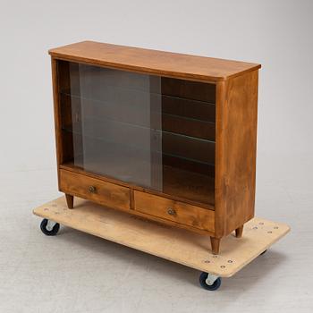 A Swedish Modern cabinet, 1940-50s.