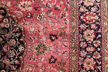A Carpet, Silk Gohm, circa  298 x 202 cm.