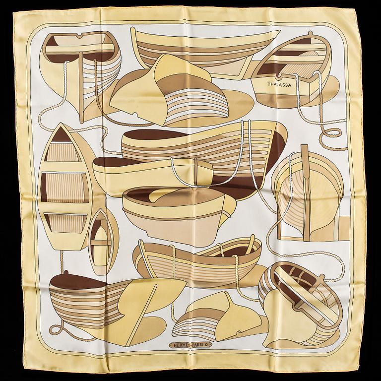 A set of three silk scarves by Hermès, "Etriers" and "Thalassa".