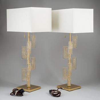 A 'Esha Alta' glass and brass table lamp from Donghia lightning.