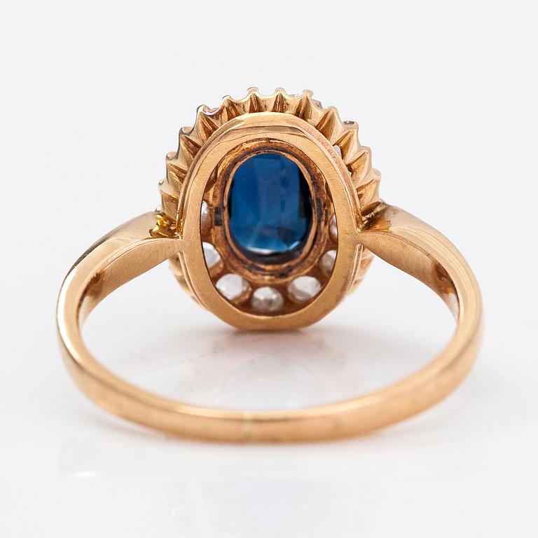 Ring, 18K guld, safir och rosenslipade diamanter. Esko Raitanen, Helsingfors.