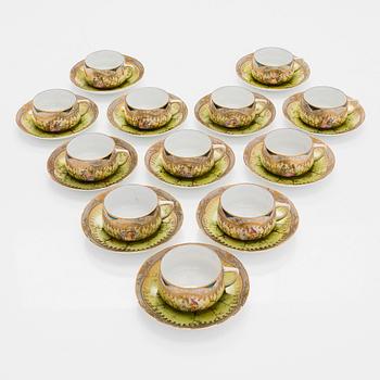 A 12-piece set of Kuznetsov porcelain coffee cups with saucers, Russia 1891-1917.