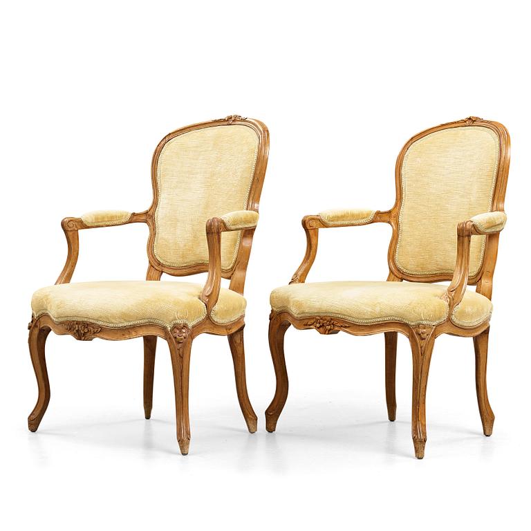 Two matched Louis XV 18th century armchairs.