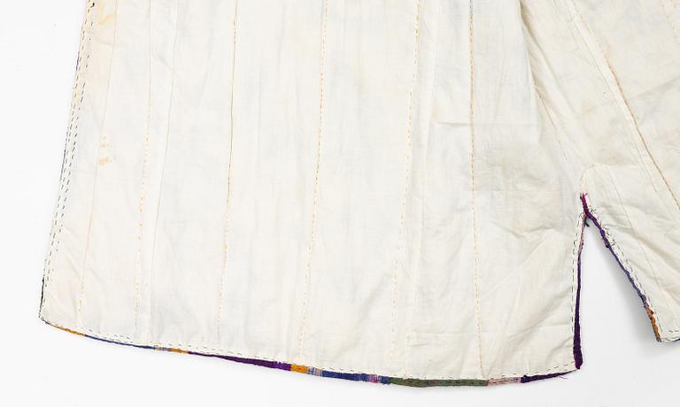 A silk Ikat Chapan, Central Asia, 1880s.