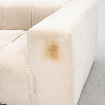 A modular "Rosso" sofa, Layered.