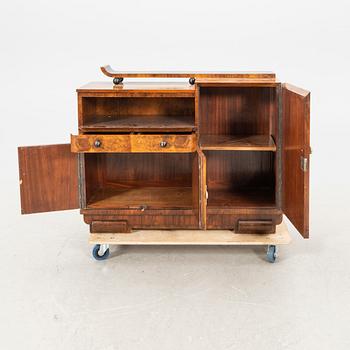 A walnut veneered Art Déco cabinet.