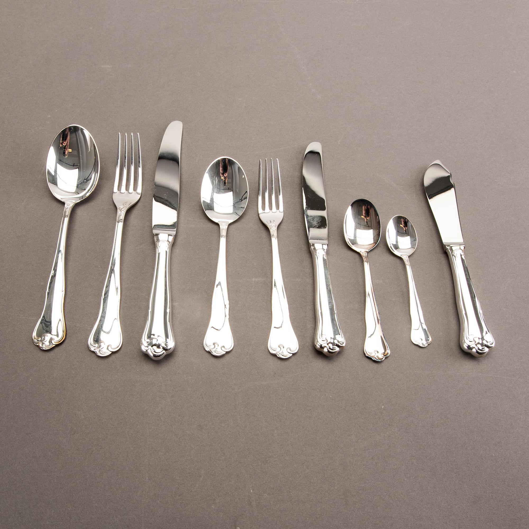 A Swedish 20th century set of 99 silver cutlery mark of Mema Linköping 1982, weight including cartoons 3140 gr.