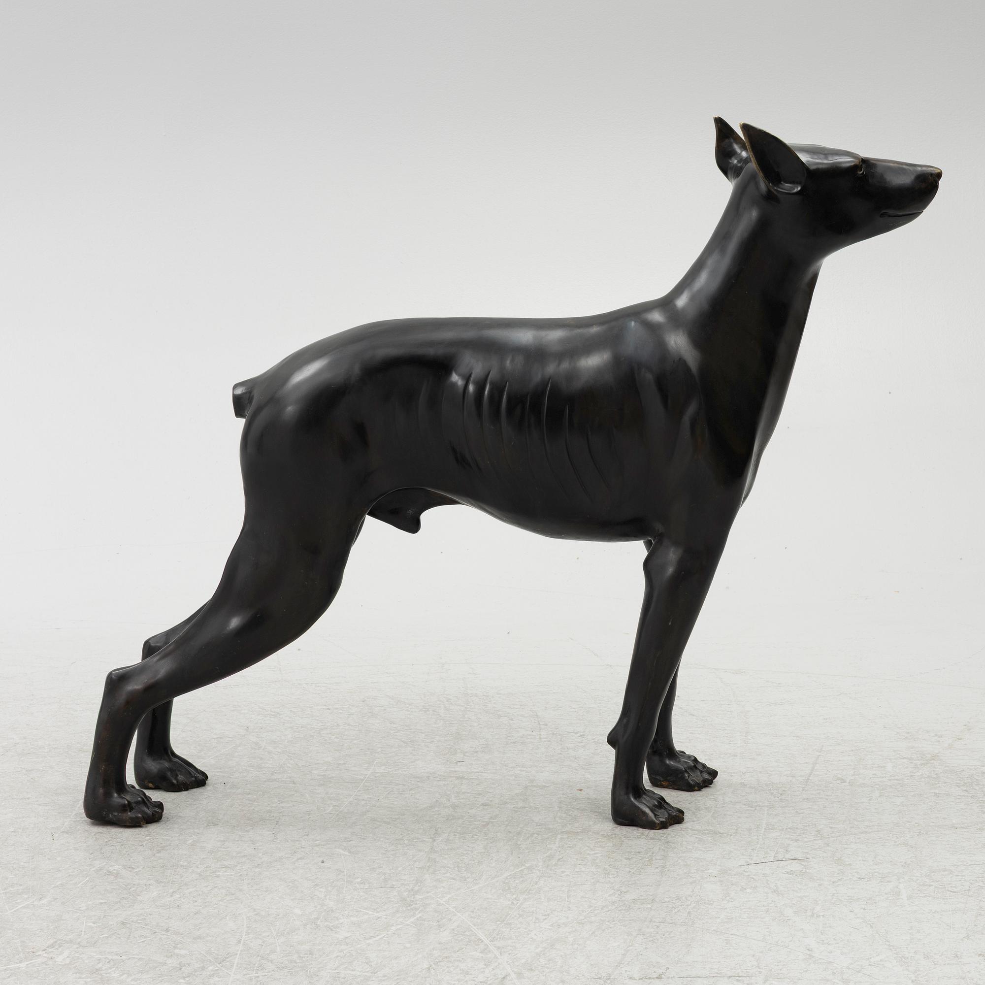 A decorative sculpture of a dog, 20th/21st century.