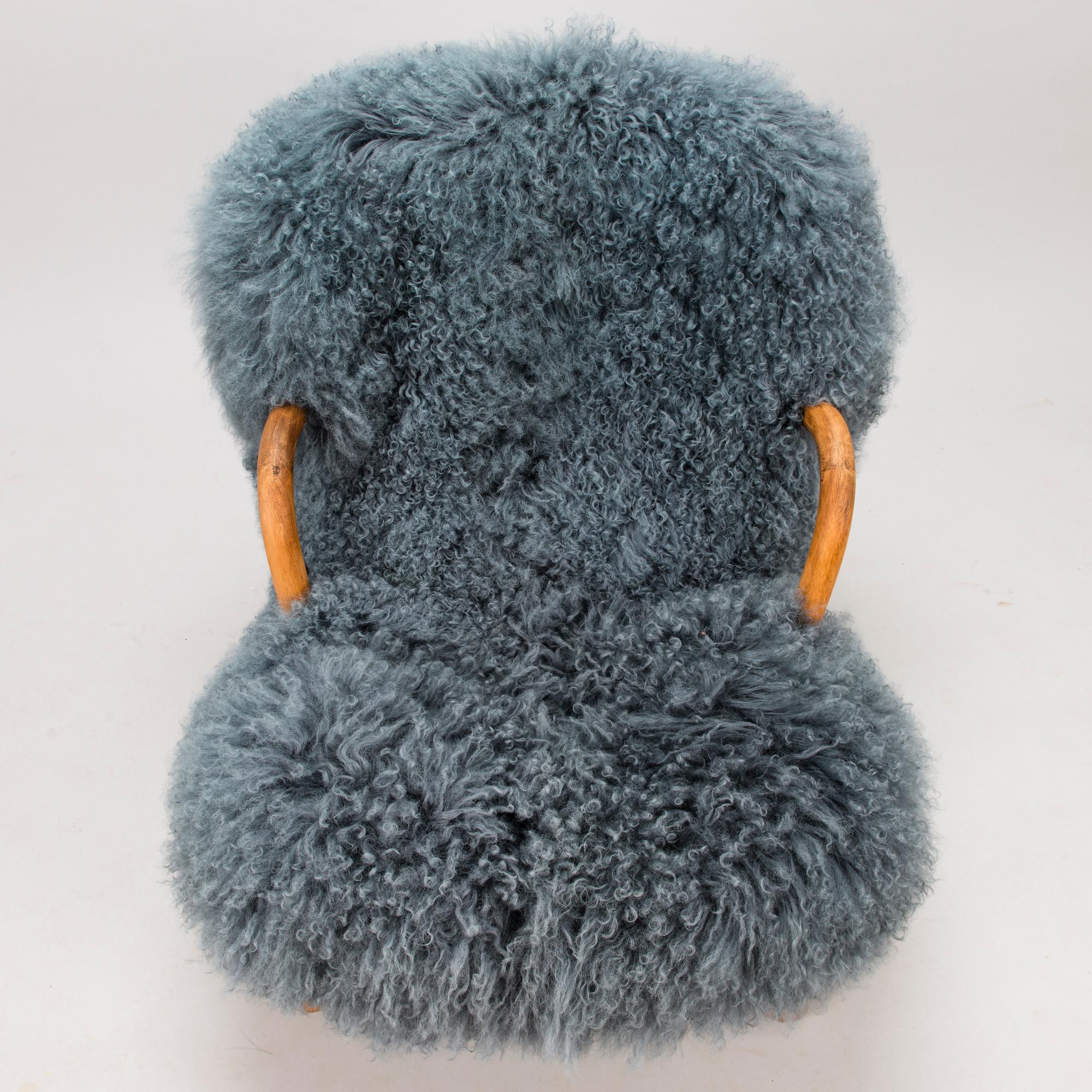 PHILIP ARCTANDER, attributed, 'Muslinge' Chiar /'Clam Chair'. model designed in 1941.