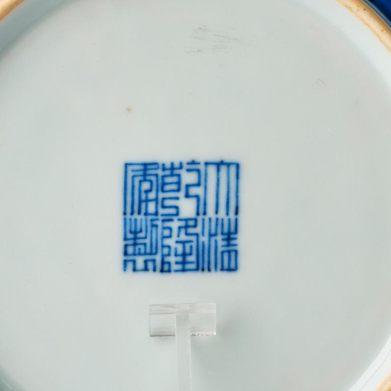 A set of three blue and white dishes, Qing dynasty with Qianlong seal mark.