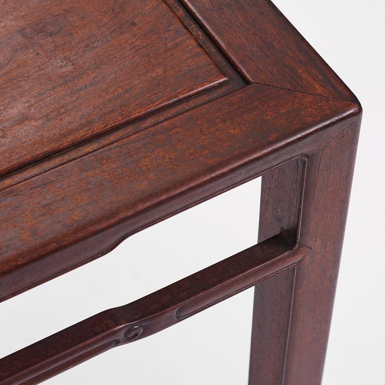 A Chinese hardwood corner-leg table, Qing dynasty.
