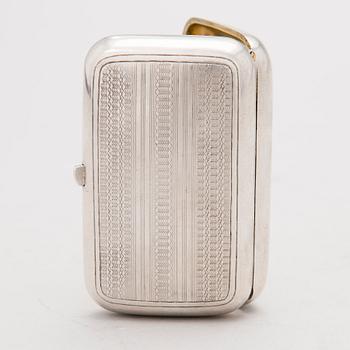 A Russian silver cigarette case, mark of OE, assay master Vasily Aleksandrovich Petrov, Moscow (1883-1893).